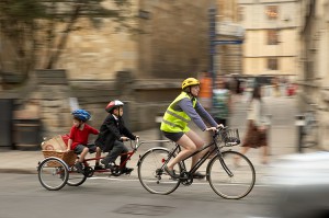 family biking together