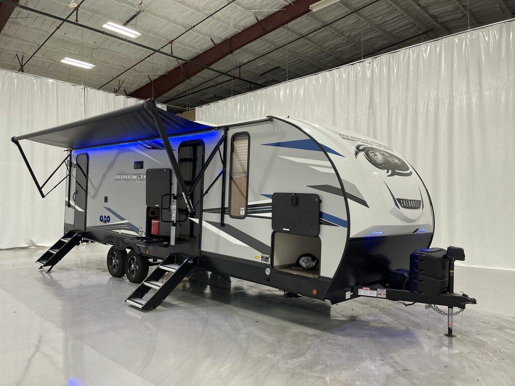 fiber glass travel trailer Alpha Wolf 26DBH-L in a studio